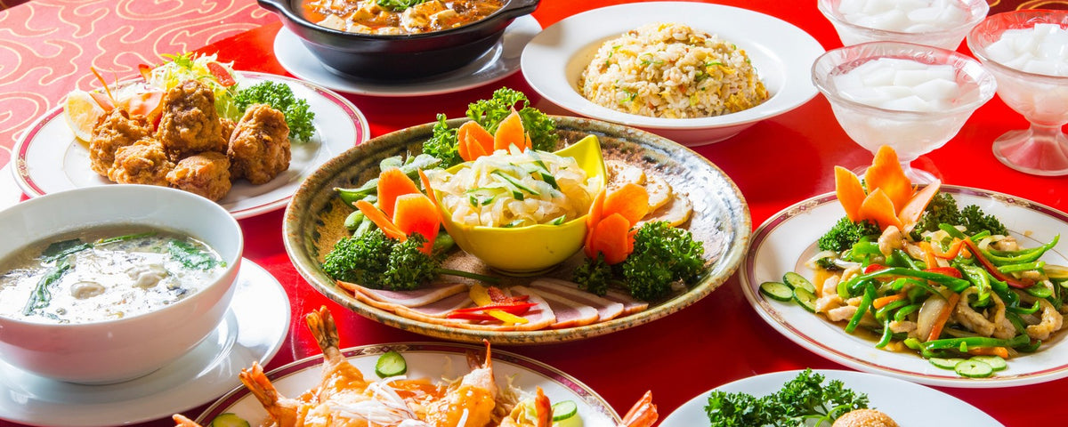 A table full of Chinese dishes