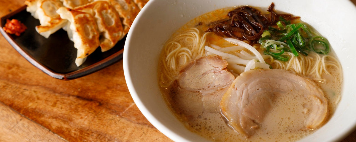 A set of Tonkotsu ramen noodles and crispy gyoza dumplings